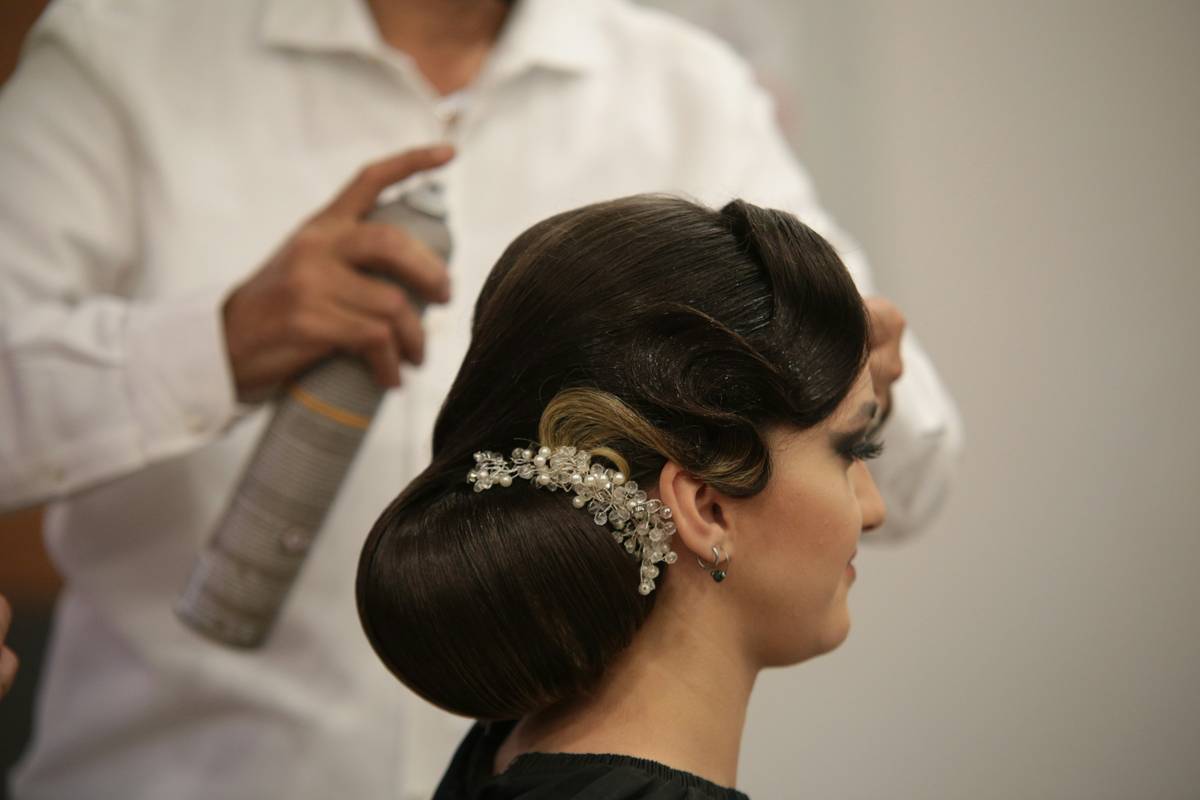 Bridal Updos with precise sectioning and secure pin placement for all-day hold